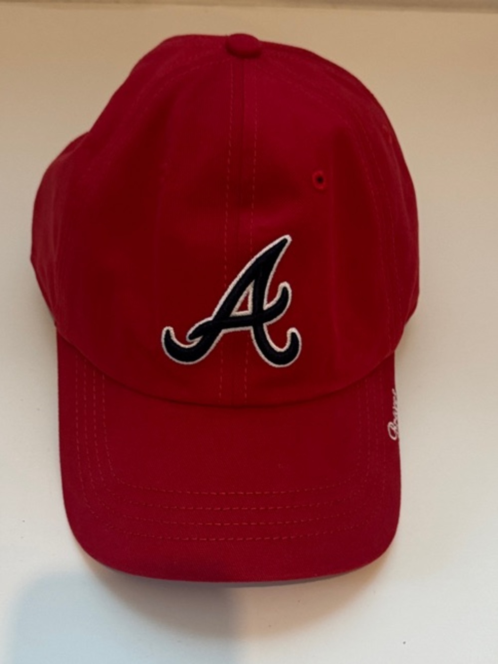 Atlanta Braves Red Baseball Cap with Embroidered 'A' Logo.